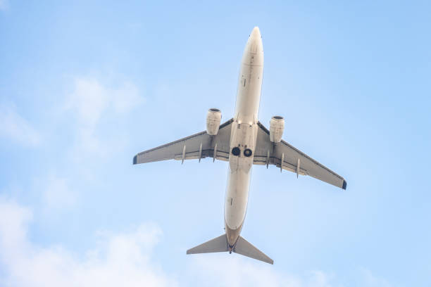 Plane is taking off with blue sky background at Phuket International Airport.Phuket Island - Thailand.
