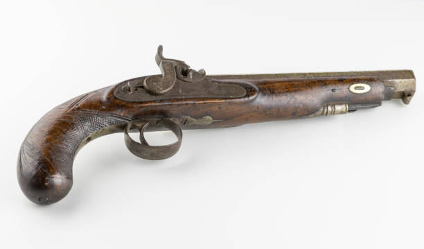 istock Vintage flintlock pistol isolated on white background 2197536944