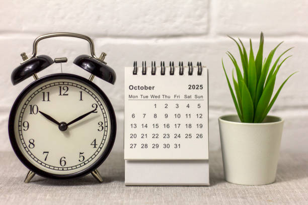 istock October 2025 calendar and clock on your desktop. 2197537700