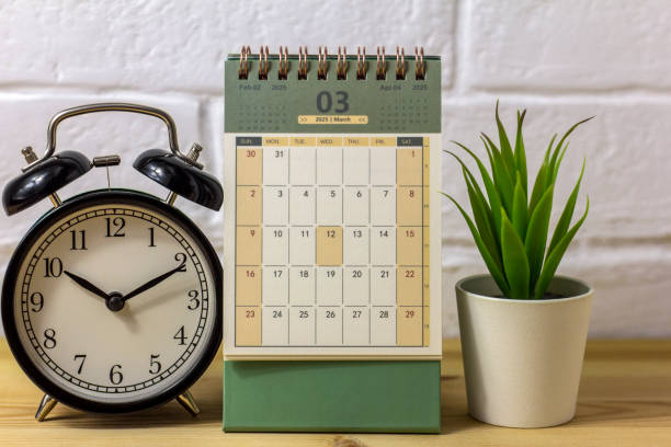 istock March 2025 calendar and clock on your desktop. 2197537779