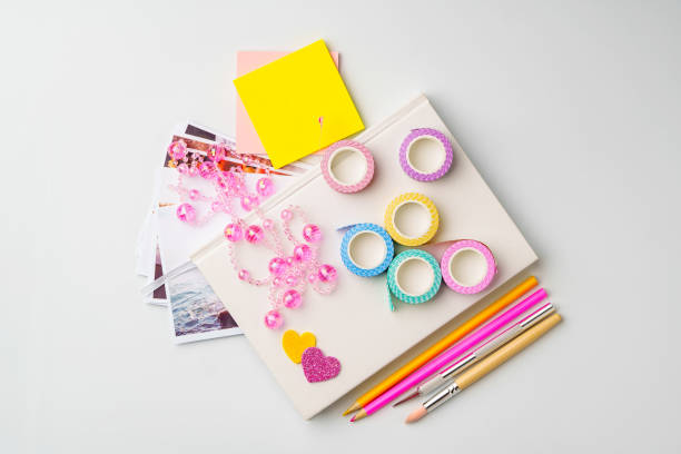 Craft supplies arranged on a clean surface ready for creative projects and scrapbooking