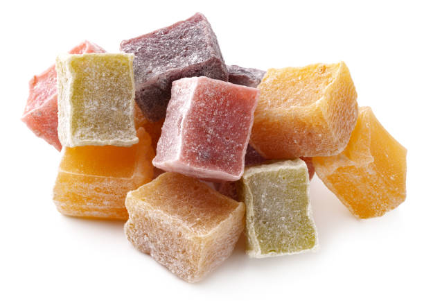istock Colorful Turkish delight pieces arranged in a decorative manner on a white surface showcasing their texture and flavors 2197539641
