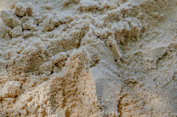 Summer sand and tropical sea background with rock beach with unique texture