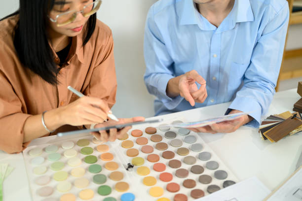 istock Creative design team discussing color samples and material swatches at co working space 2197542907