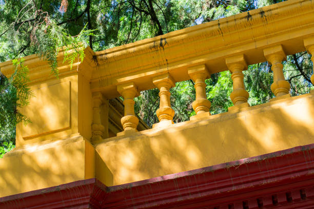 yellow stone pillar fence in park