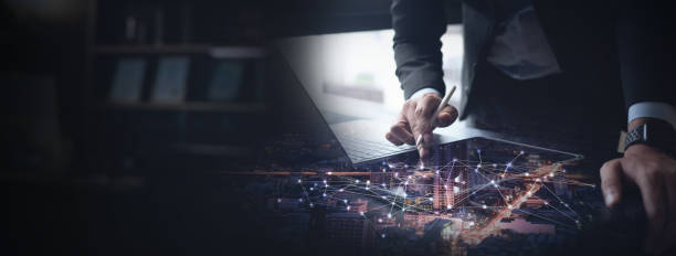 istock Internet network connection, digital marketing, global business concept. Businessman using digital tablet and laptop computer connection with business target, global network, online marketing plan 2197545880