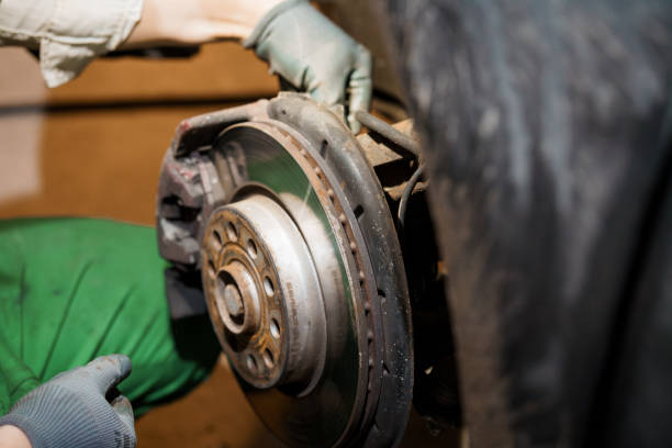 istock Car Brake Inspection and Maintenance Close-Up 2197546350