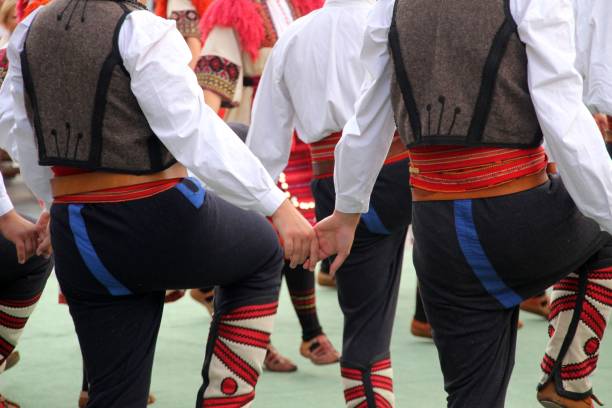 istock Traditional folk dancers in vibrant costumes 2197549017