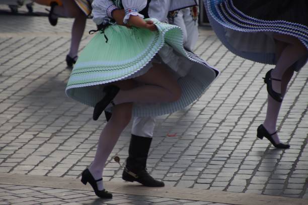 istock Balkan folk dancers in traditional costumes 2197549128