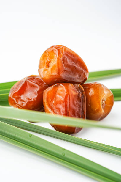 Dates fruit sukari or kurma sukari, isolated on white background