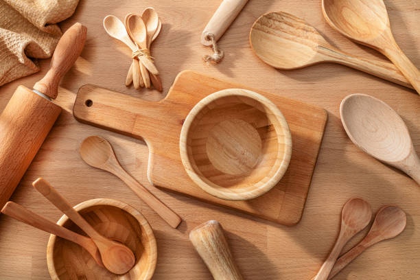 istock Wooden kitchen utensils composition on rustic wood table 2197551861