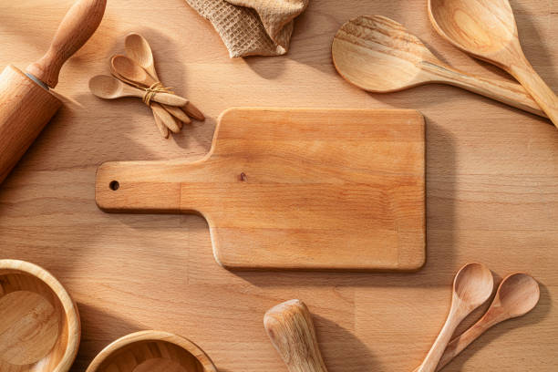 istock Wooden kitchen utensils composition on rustic wood table. Copy space 2197551863
