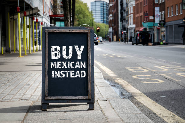 istock BUY MEXICAN INSTEAD. Foldable advertising poster on the street 2197553253