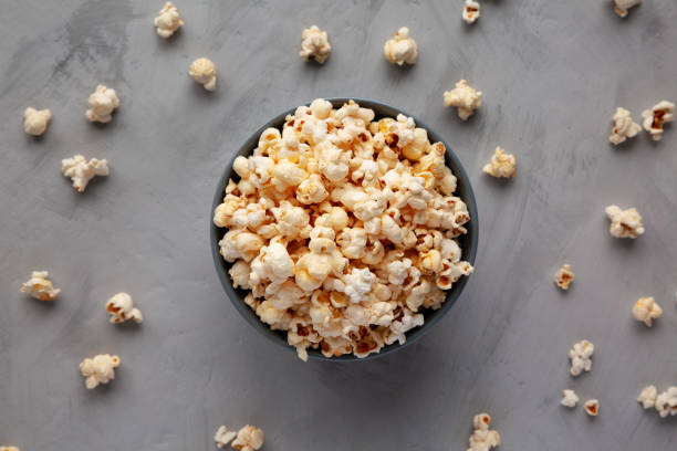 istock Homemade Kettle Corn Popcorn with Salt in a Bowl, top view. Flat lay, overhead, from above. 2197554990