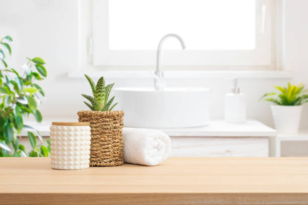 istock Spa decor products composition on wooden table in blurred bathroom interior background 2197557801