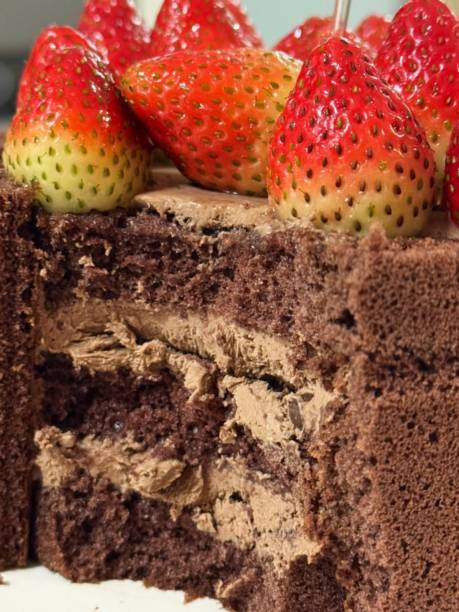 Soft and moist strawberry chocolate cake with rich cocoa layers and sweet strawberry filling. A perfect blend of deep chocolate flavor and fresh fruity sweetness for a delightful dessert.