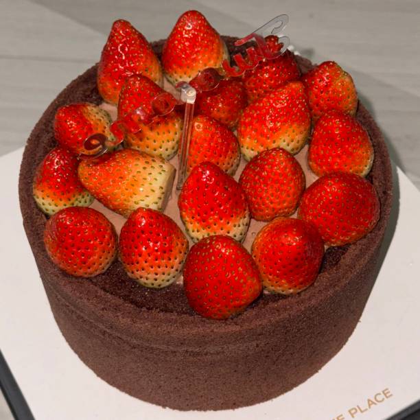 Soft and moist strawberry chocolate cake with rich cocoa layers and sweet strawberry filling. A perfect blend of deep chocolate flavor and fresh fruity sweetness for a delightful dessert.