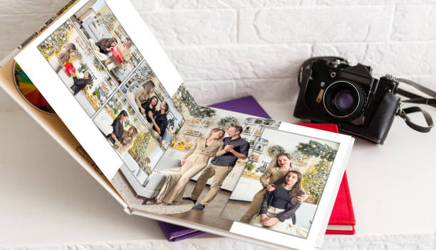 istock photo book with christmas photos 2197558783