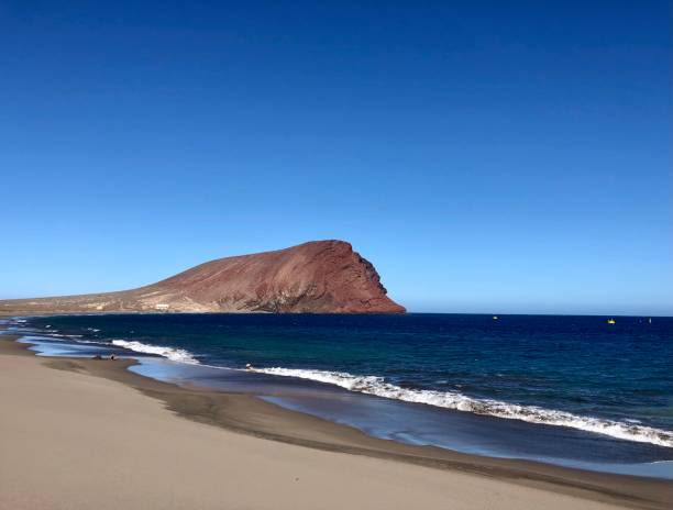 istock Red mountain of El Medano 2197559932