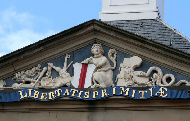 street name sign for Graslei, a historic quay and street in the centre of the Belgian city of Ghent, located on the right bank of the Leie river; Ghent, Belgium