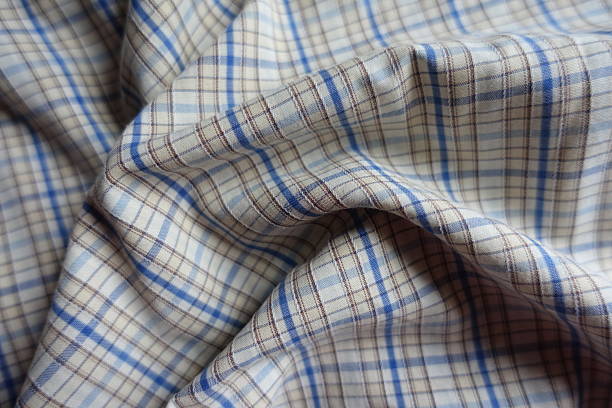 istock white, blue and brown checkered cotton fabric in soft folds 2197560675