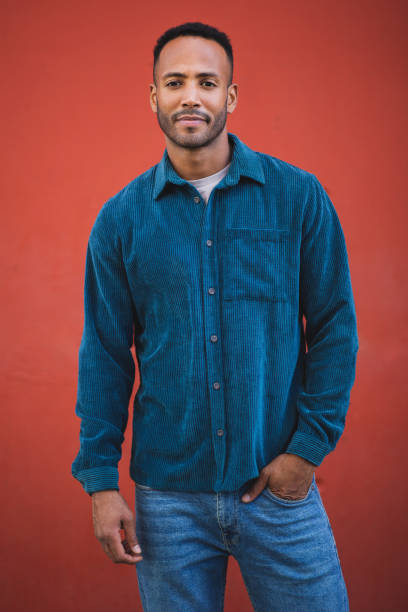 istock Happy man posing with one hand in pocket 2197562166