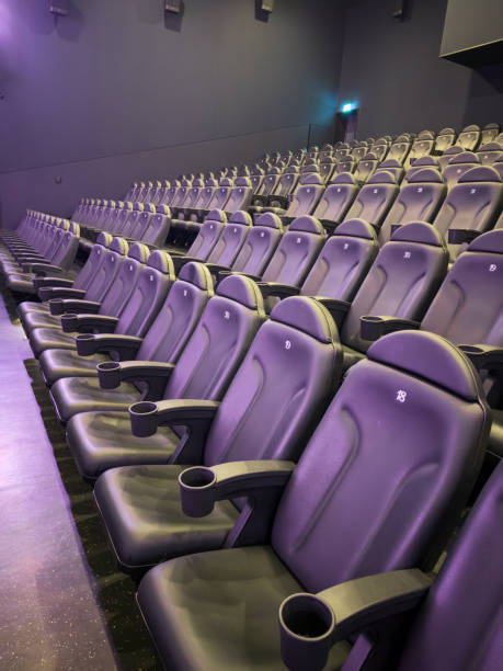 istock Cinema auditorium with rows of chairs in a row. 2197562576
