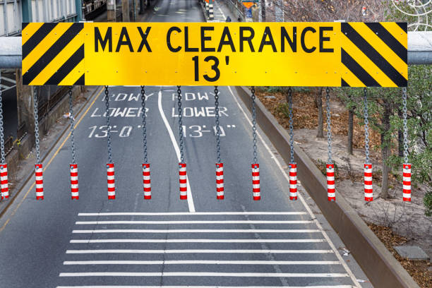 Clearance sign in front of a bridge, the Queensboro Bridge in New York