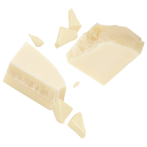 istock White Chocolate explosion. Levitating milk chocolate pieces shattering isolated on white background. Falling  Chocolate chunks, shavings and cocoa crumbs 2197565914
