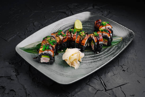 istock Delicious sushi rolls served on a decorative plate with wasabi and ginger 2197567211