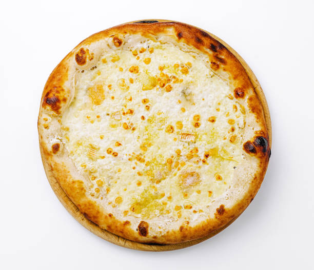 istock Delicious white pizza with a crispy crust and melted cheese sitting on a wooden serving board 2197567317