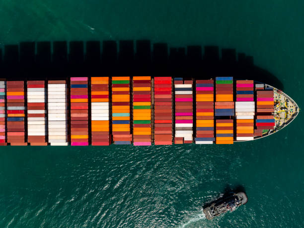 istock aerial top view cargo logistic container ship sailing in sea, import export goods and distributing products to dealer and consumers across worldwide, 2197569412