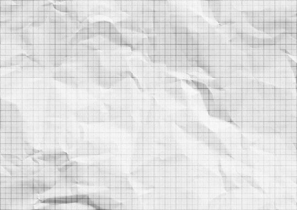 istock White crumpled millimeter paper black lines. 2197574874