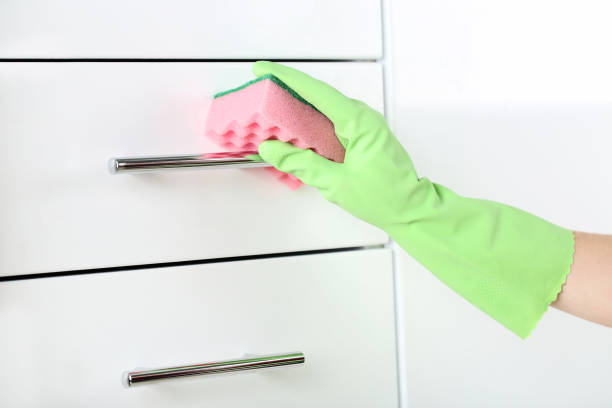 istock Hand in glove cleaning kitchen drawer 2197575688