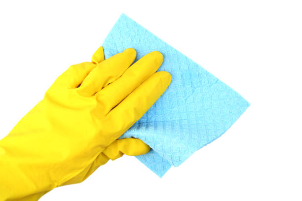 istock Female hand holding cleaning wipe on white background 2197576919