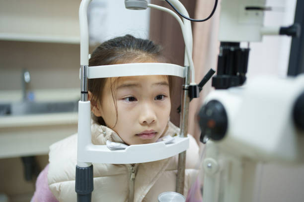 istock Little girl having her eyesight tested 2197576924