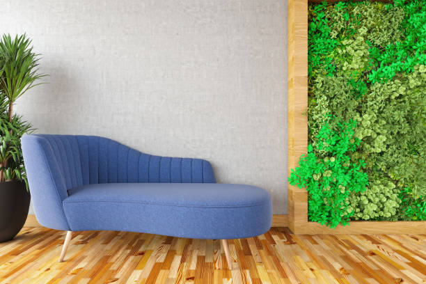 istock Armchair with an Empty Concrete Wall and Vertical Garden 2197579362
