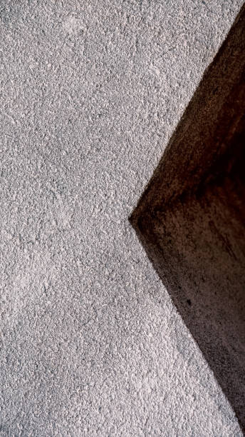 istock abstract geometric background gray concrete wall with triangle 2197579722