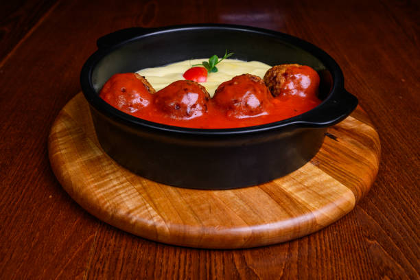 Meatballs in tomato sauce and mashed potatoes