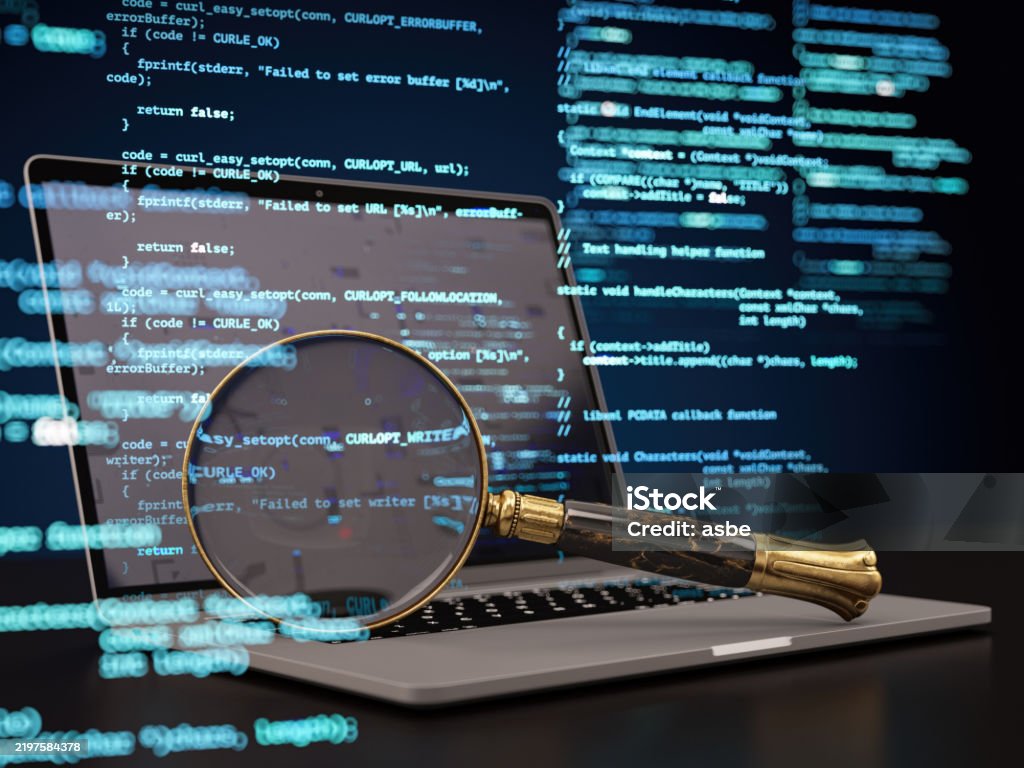 Programming Research Concept With A Magnifier On Laptop And Computer ...