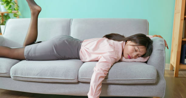 istock asian businesswoman lying flat sofa 2197585072