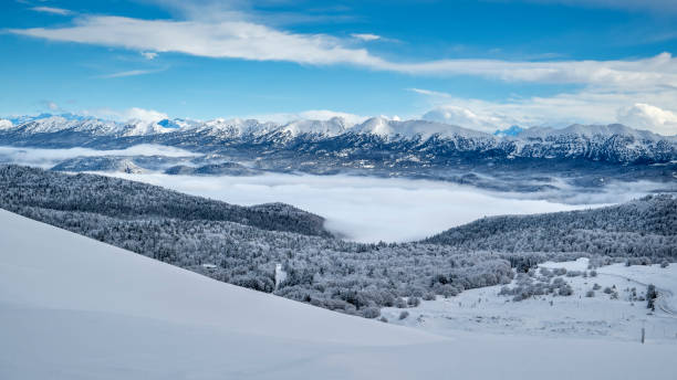istock Snowy mountain landscape 2197585150