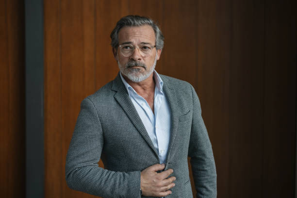 istock Stylish man posing in an elegant indoor setting 2197588691