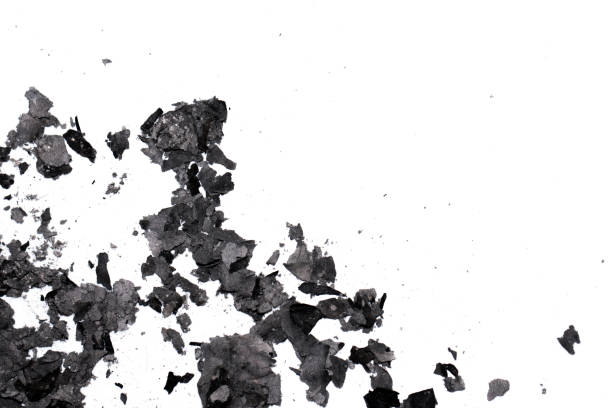 istock Scattered burnt ashes and debris on a white background 2197591385