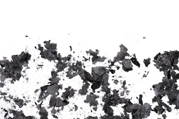 istock Scattered burnt ashes and debris on a white background 2197591731