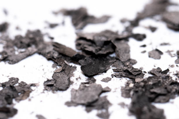 istock Scattered burnt ashes and debris on a white background 2197591953