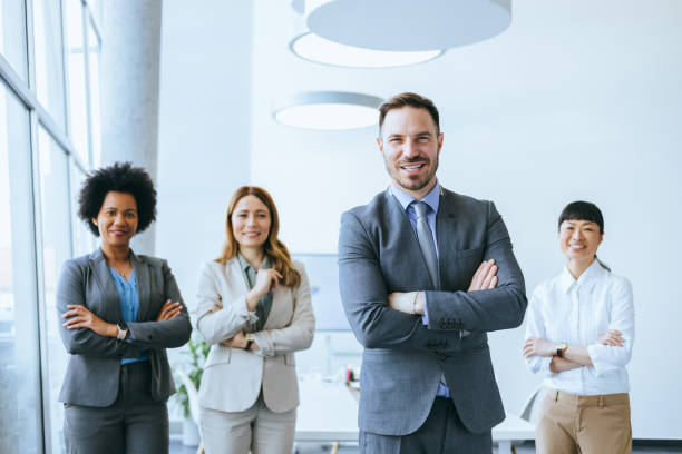 istock Male executive leading diverse office team 2197595077