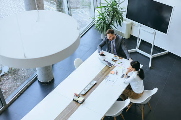 istock Businesspeople working in a bright office space 2197595098