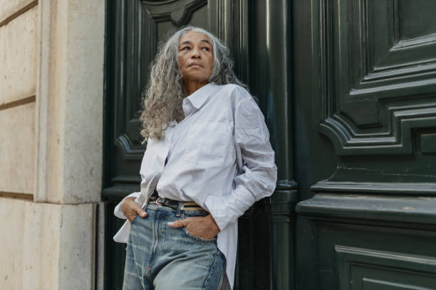 istock Elegant Older Woman in Stylish Urban Setting 2197595253