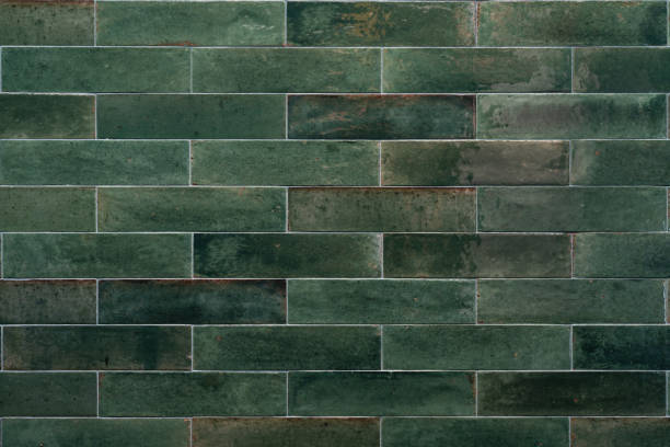 old, green, rustic tiled wall - chão de azulejo imagens e fotografias de stock